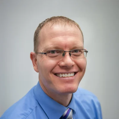 A headshot photo of Dr. Todd Dorval, a chiropractor at Health & Wellness Chiropractic Center